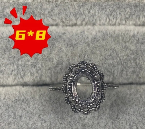 Oval open mouth ring with 6x8mm stone and five-pointed star design on electroplated copper