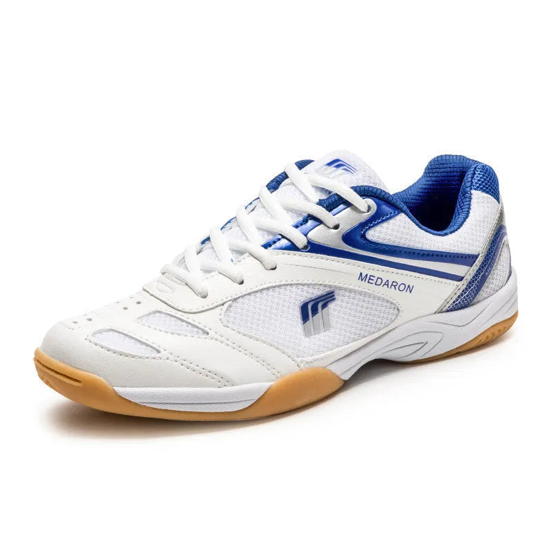 White and red table tennis sneakers with lace-up front and rubber sole.