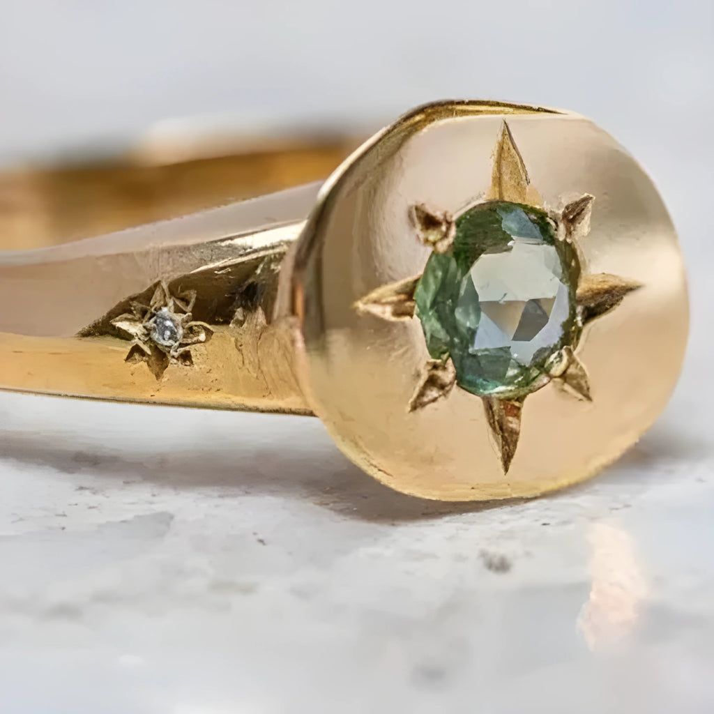 Gold-colour adjustable ring with a micro-inlaid oval star design on a zinc alloy band.
