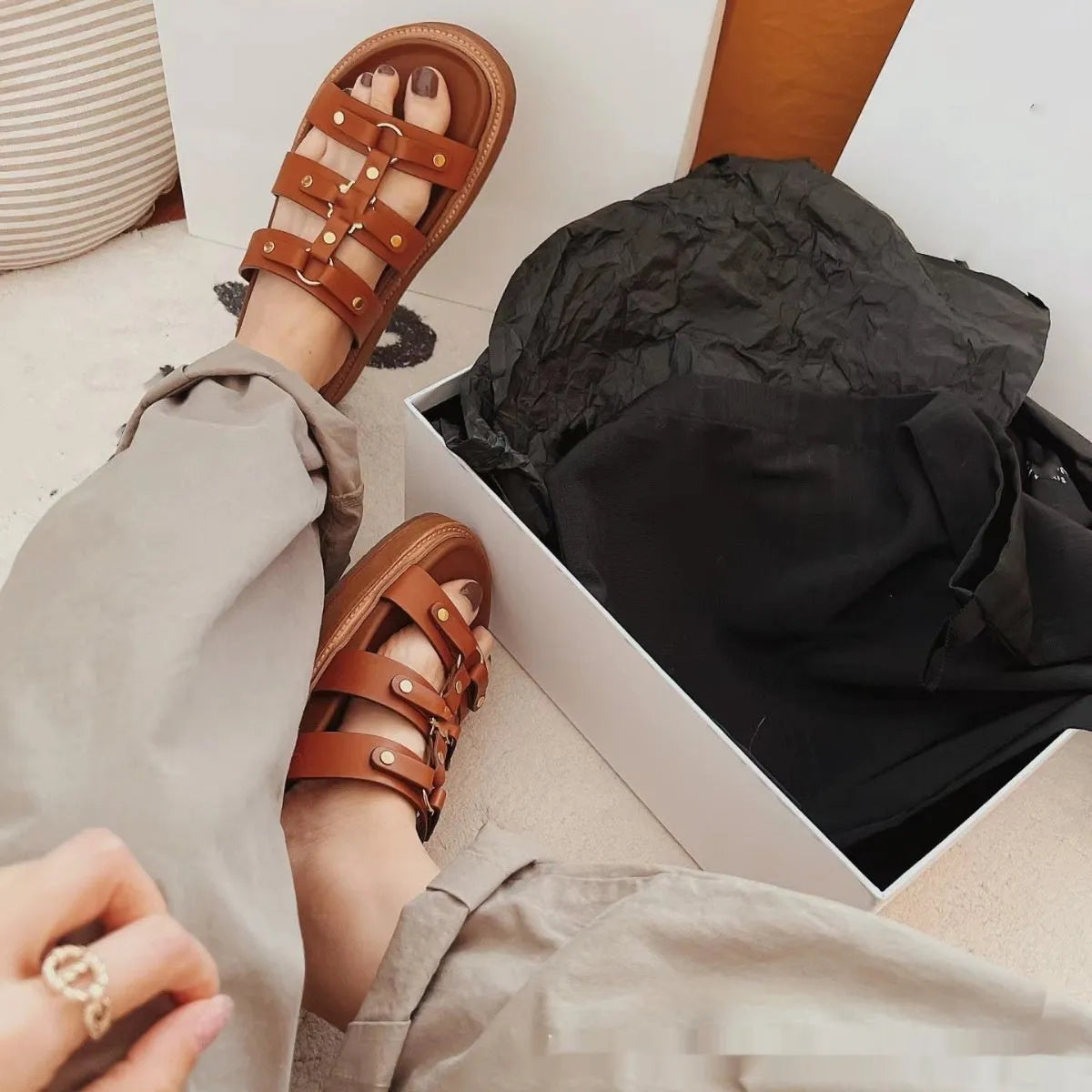 Women's white Roman sandal slippers made from sheepskin leather with patent leather finish