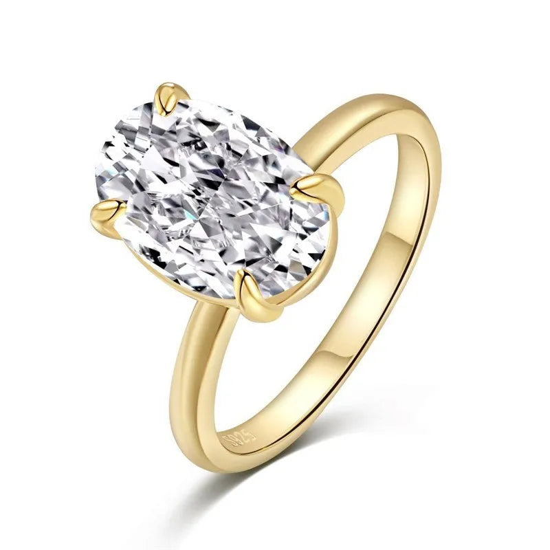 Women's oval ring with four-claw setting in gold or silver colour, 6x9mm gemstone