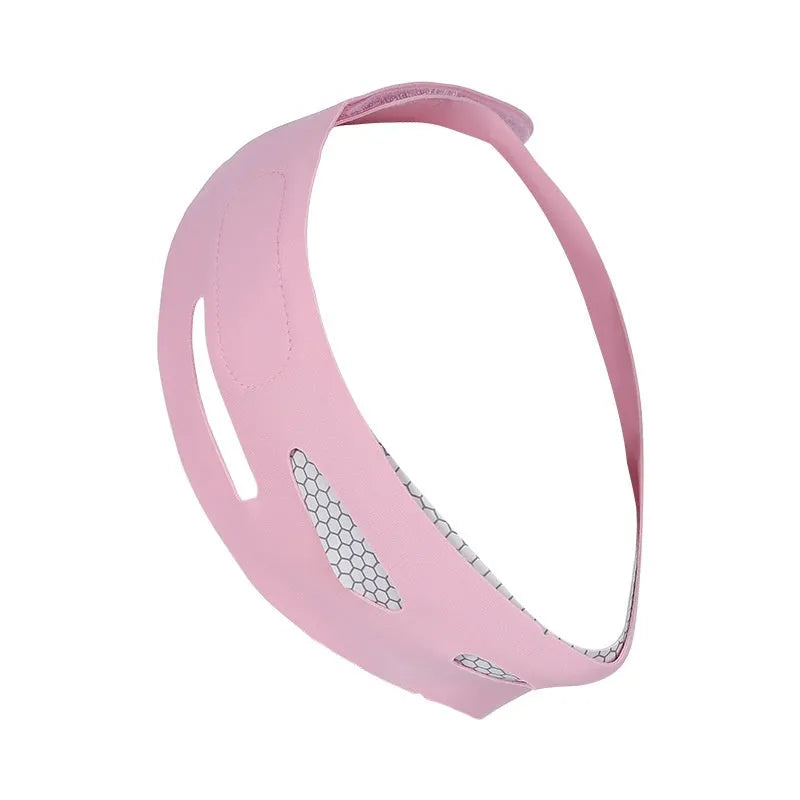 Pink elastic V-shaped face bandage with adjustable black velcro strap on a white background.