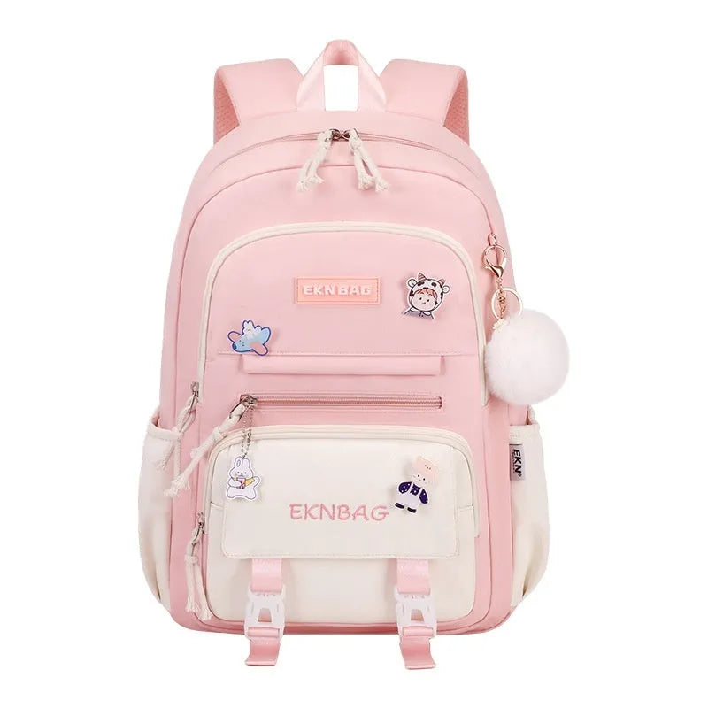 Pink waterproof school backpack set for girls with matching pencil case and tuition bag on a white background.