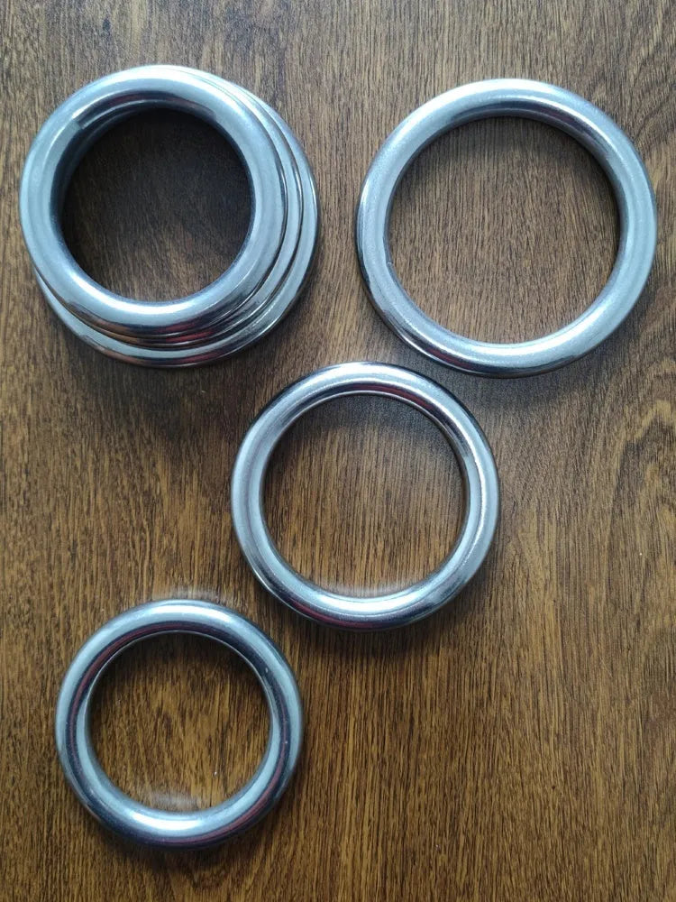 Electroplated carbon steel Wing Chun training ring for forearm strength, shown in three sizes.