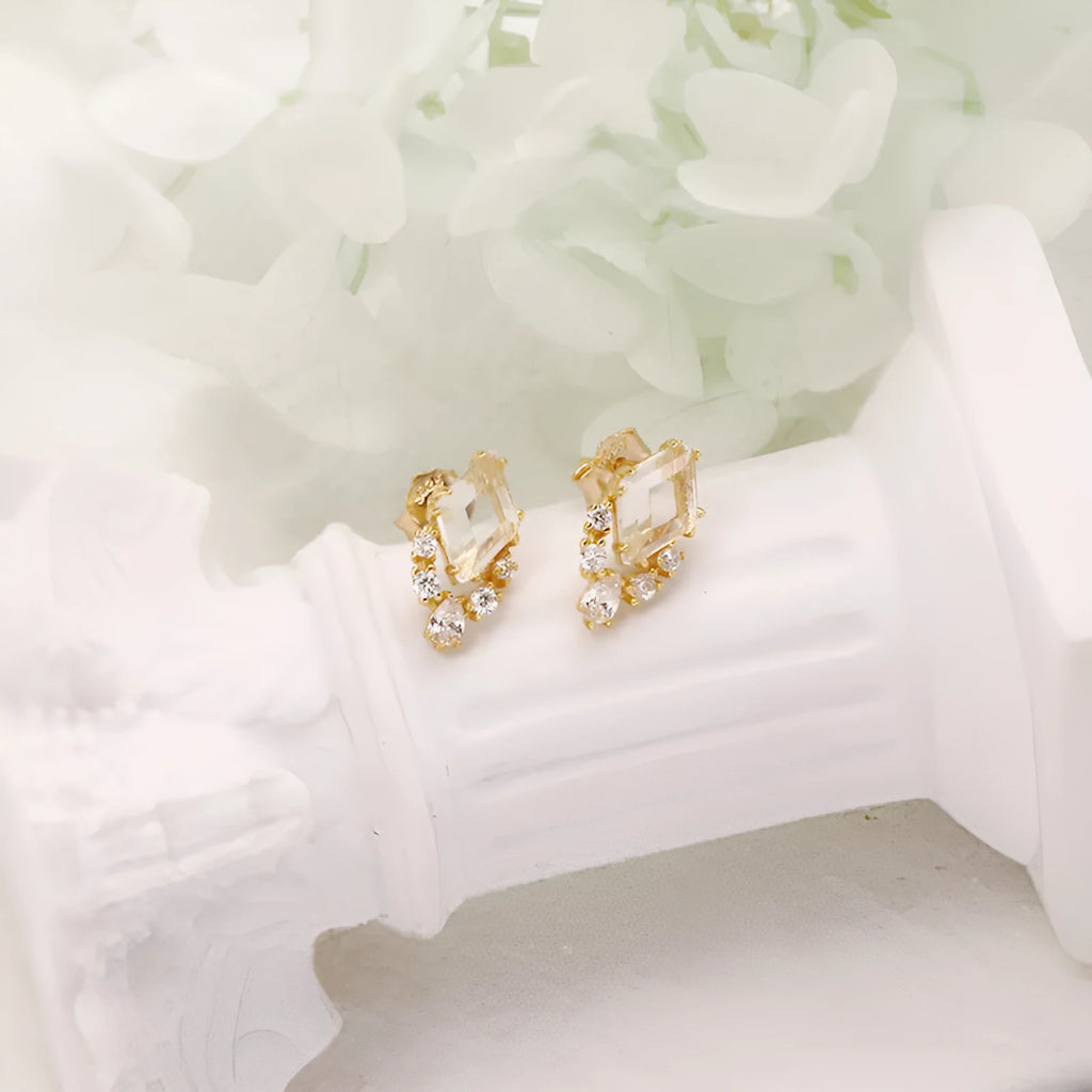 Geometric silver earrings with white crystal studs on 925 silver backing