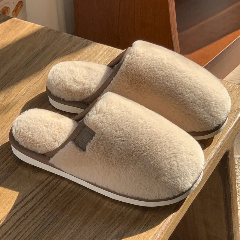 A pair of solid-colour winter plush slippers with a non-slip PVC sole, shown in a selection of available colours.