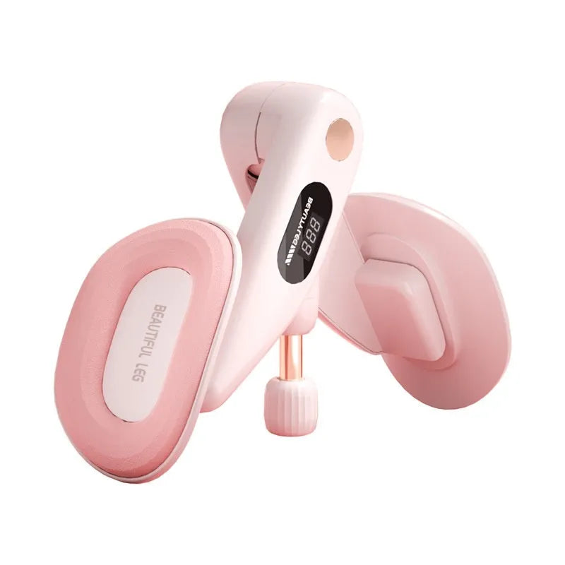 Grey coloured pelvic floor muscle trainer with a counter display, held in hand.