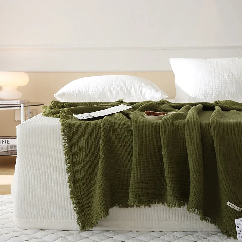 Four-layer gauze cotton blanket with tassel trim in an array of ten colours