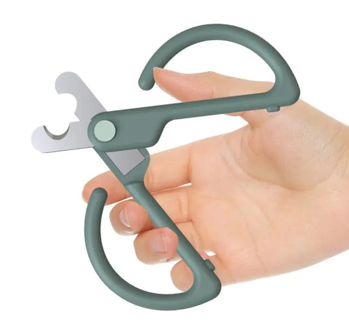 Grey cat nail clippers with ABS handle and 3CR13 blade on a light background