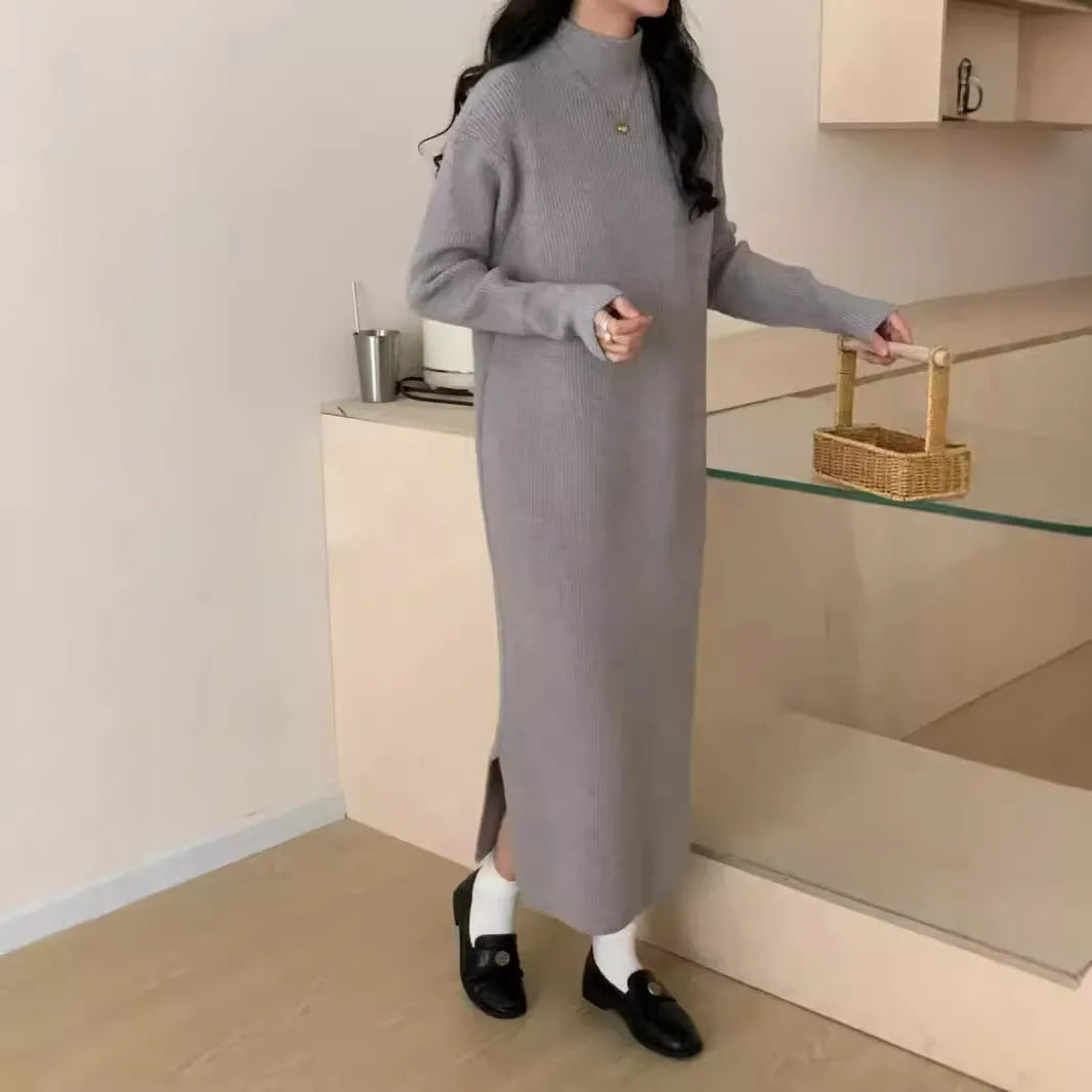 Acrylic knitted dress with half turtleneck, high waist, and midi length in solid colour
