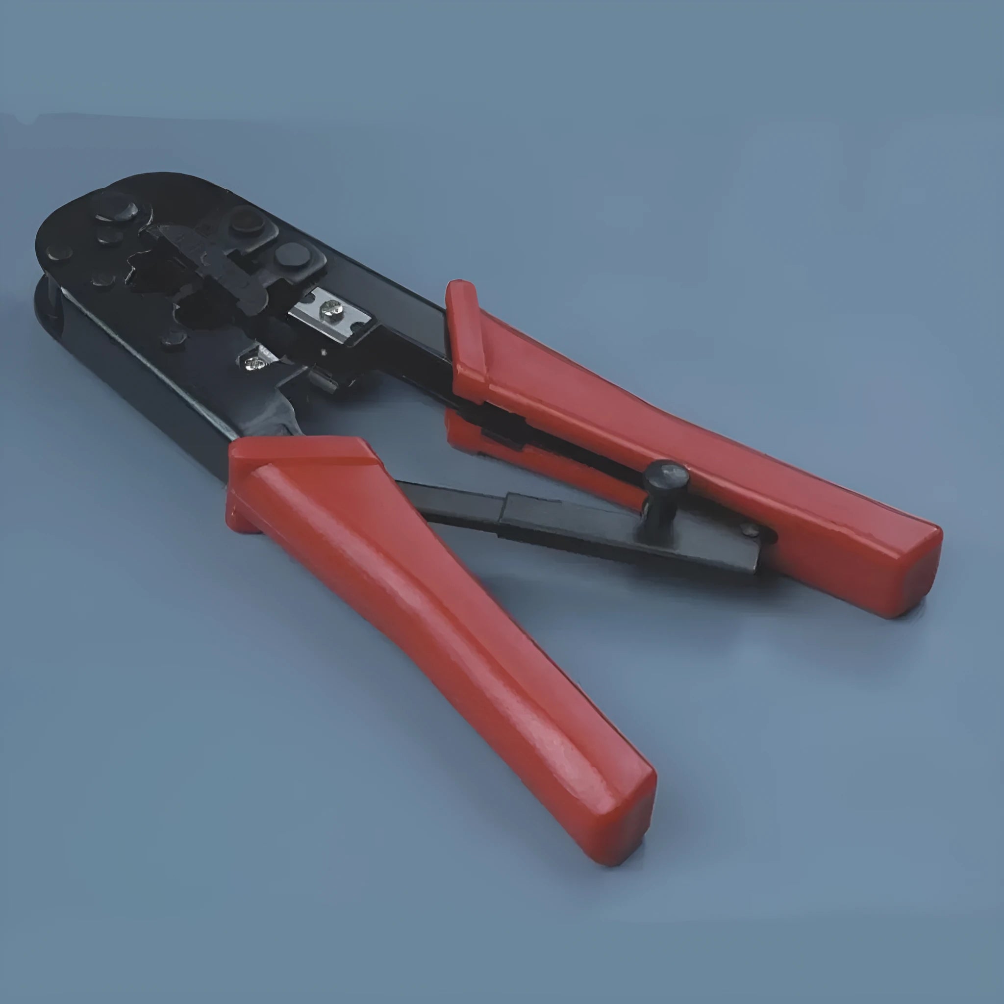 Red high carbon steel crimping tool with round mouth and flame retardant handles