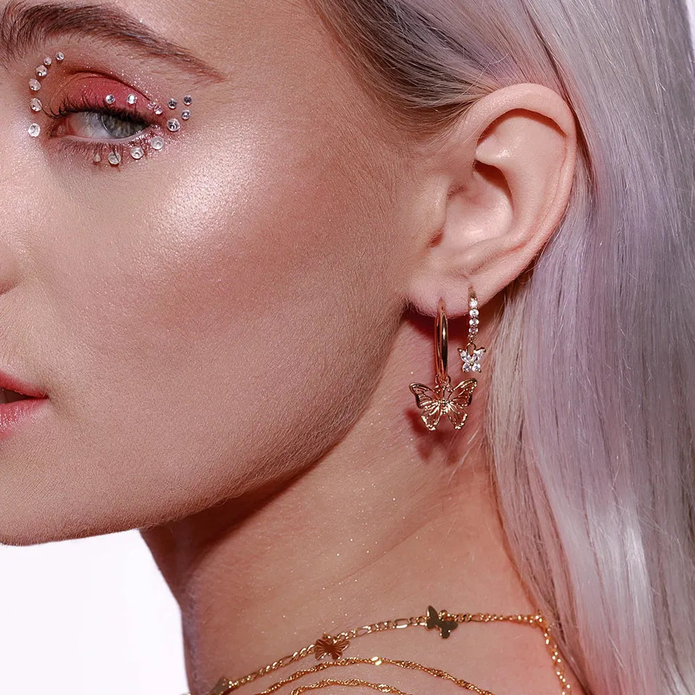 Gold and rose gold butterfly bow stud earrings, electroplated finish on copper alloy base