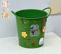 Round metal desk pen holder with iron art design in various colour options including pink, green, red, white and yellow