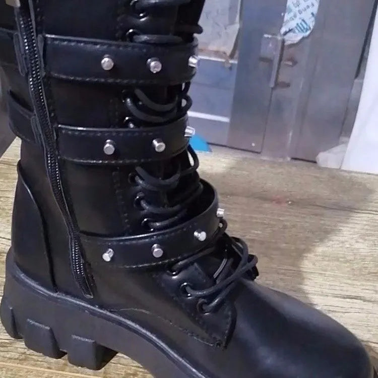Women's black mid-calf knight boots with a metal buckle and side zip fastening