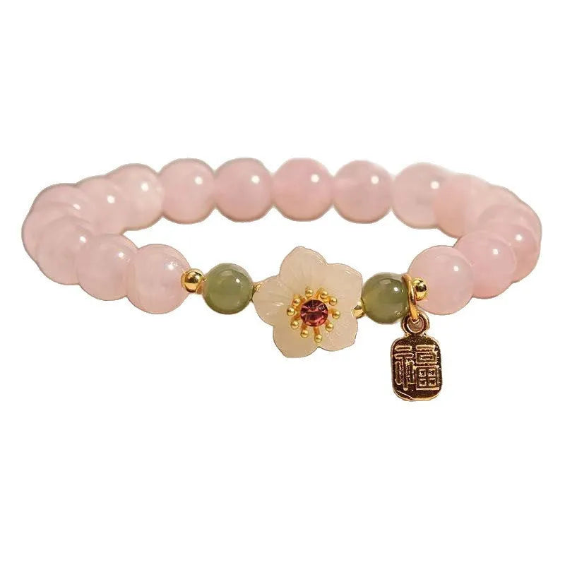 Women's crystal bracelet with peach blossom design and Hetian jade beads in blessing card colour
