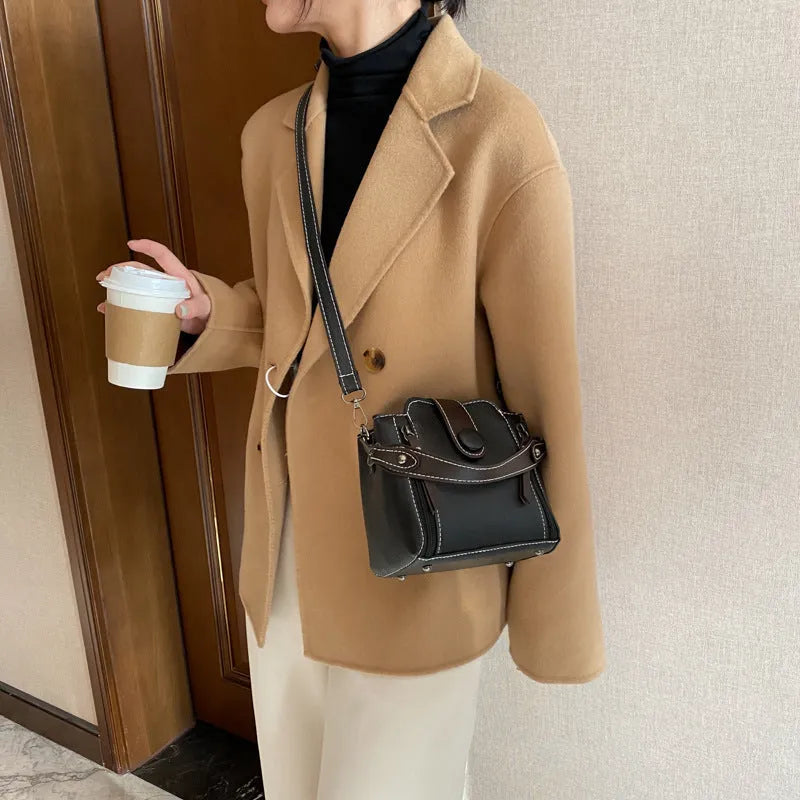 PU shoulder crossbody bag in white, blue or black with adjustable strap and retro street style