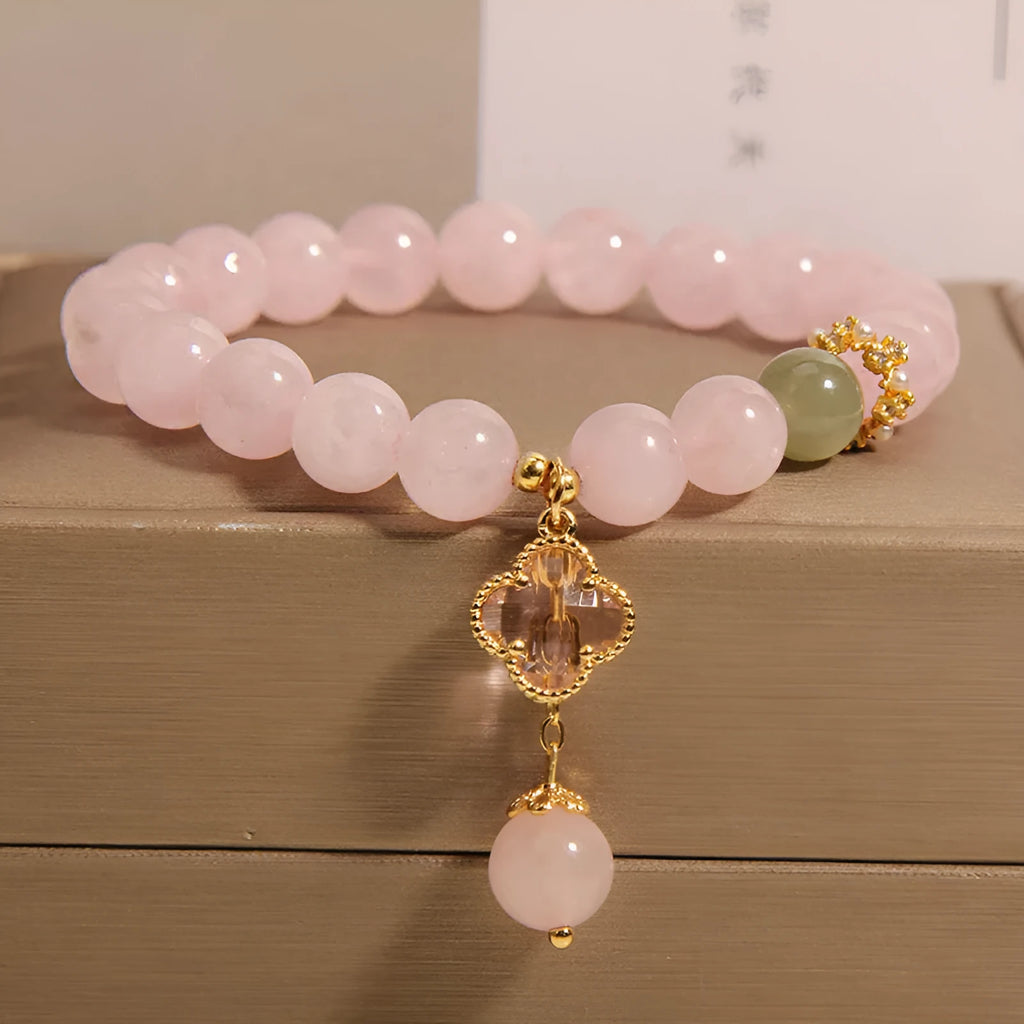 Pink crystal four-leaf clover pendant women's bracelet with alloy inlay and rhinestone details