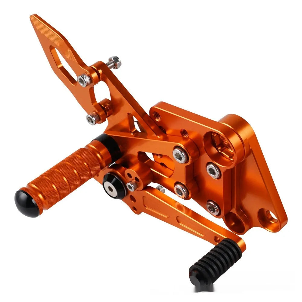 KTM DUKE motorcycle rear shift pedal support assembly modification kit in black and orange