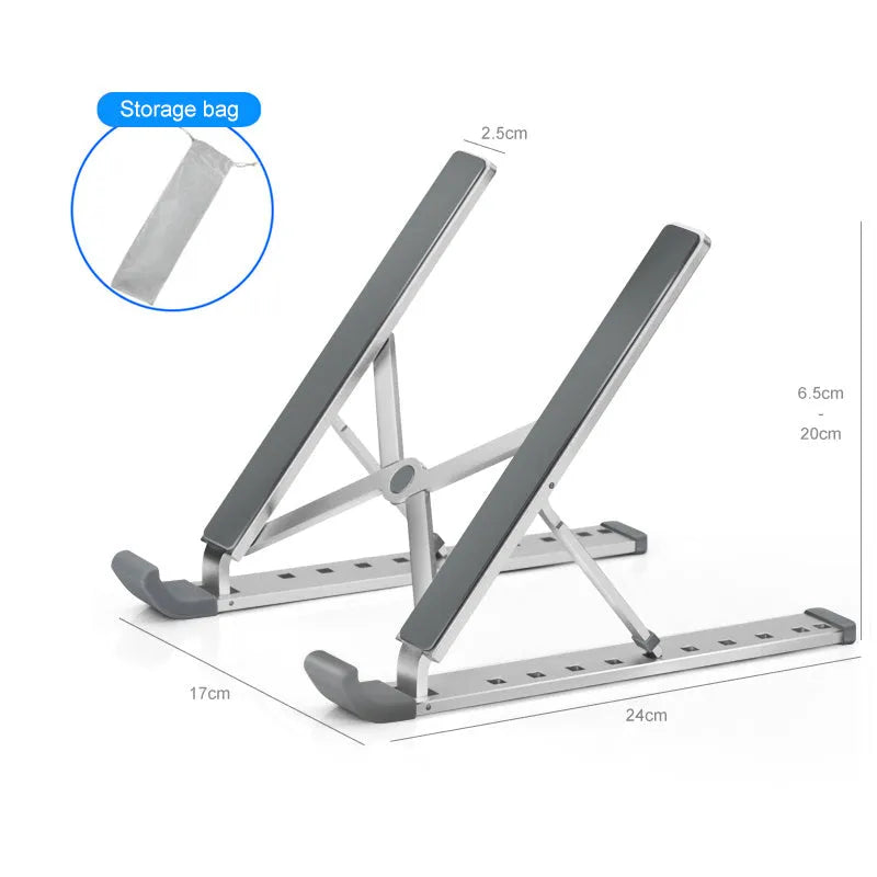 Silver adjustable folding laptop stand with hollow bottom and non-slip pads on a desk