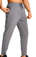 Men's loose fit casual polyester trousers in solid colour available in multiple sizes