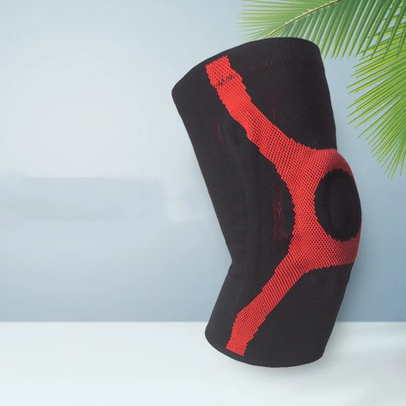 Red and grey knitted sports knee pads with silicone non-slip protection for running and climbing.