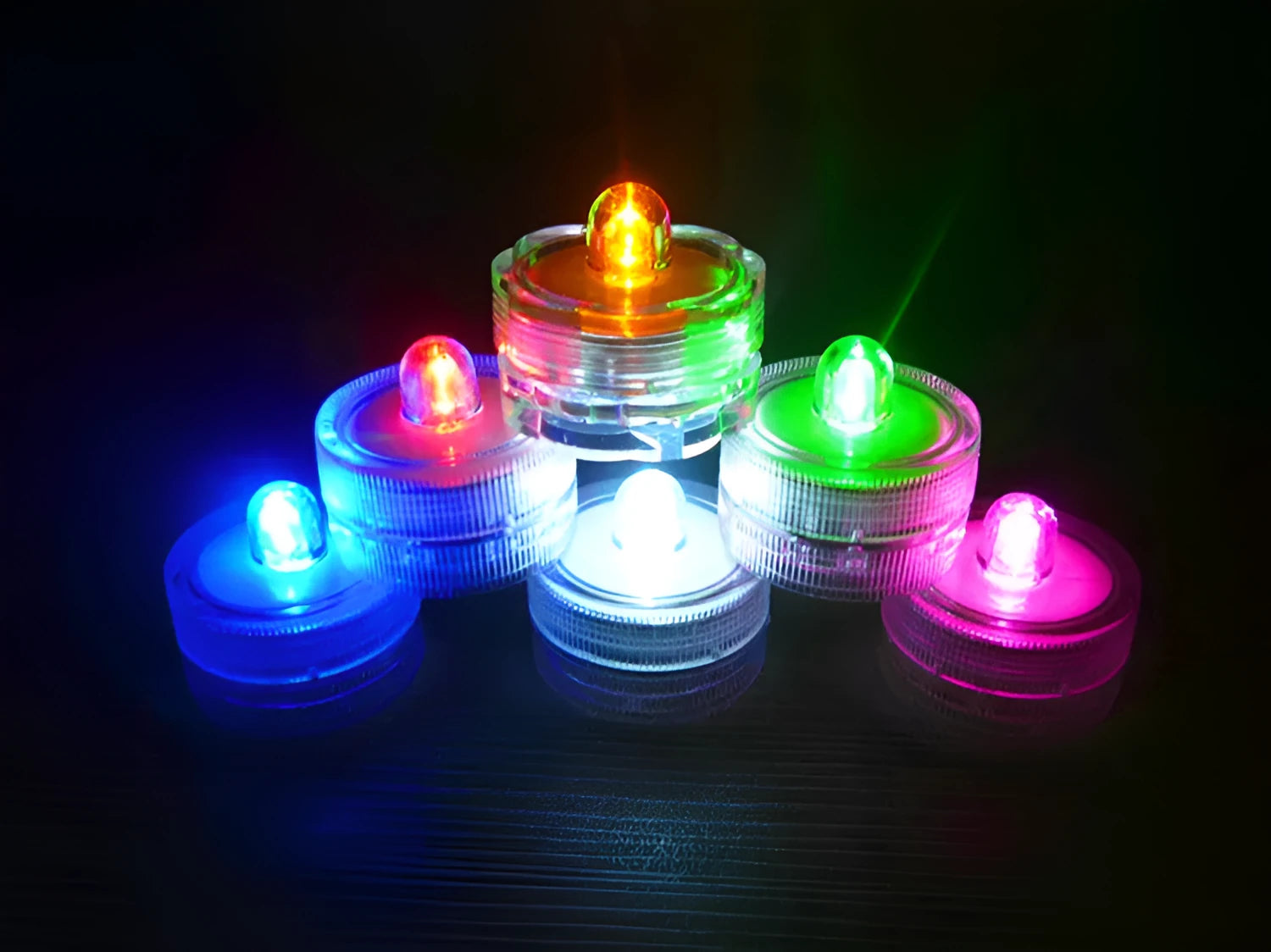 LED waterproof electronic candle light in seven colours, 3cm diameter, 2.6cm height, plastic body, 12-pack