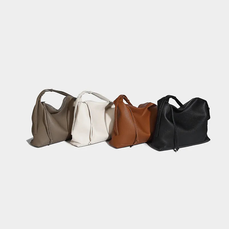 Large capacity soft PU leather messenger bag in caramel and elephant grey colours showing 36cm dimensions