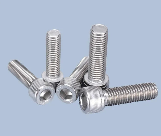 Stainless steel phono cartridge mounting kit with various bolts, nuts, washers and two allen keys