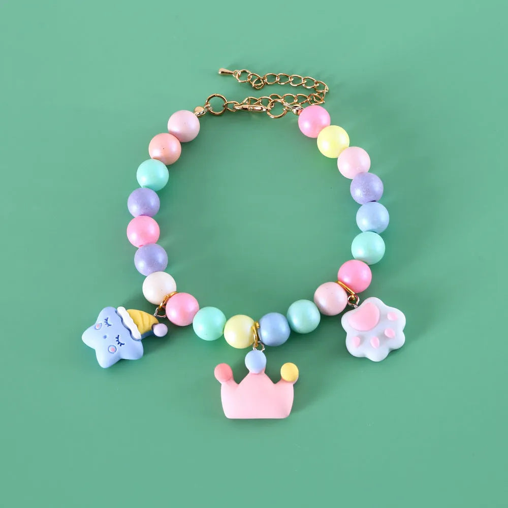 Macaron-themed resin decorative collar for a small dog or cat, shown in one of seven colour options.