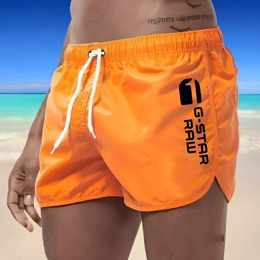 Men's thin hemp-blended polyester sports shorts in multiple colours on a size chart background.