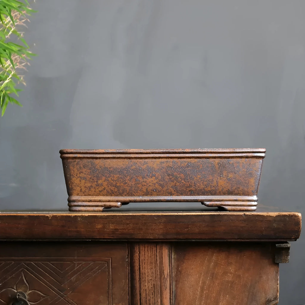 Rectangular purple sand bonsai pot with firewood burning finish and five-line basin design.