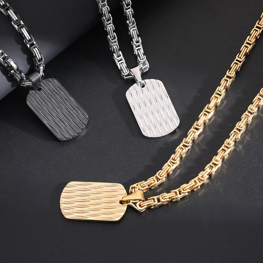 Men's titanium steel geometric water ripple pendant necklace on adjustable emperor chain in black, gold, or silver finish.