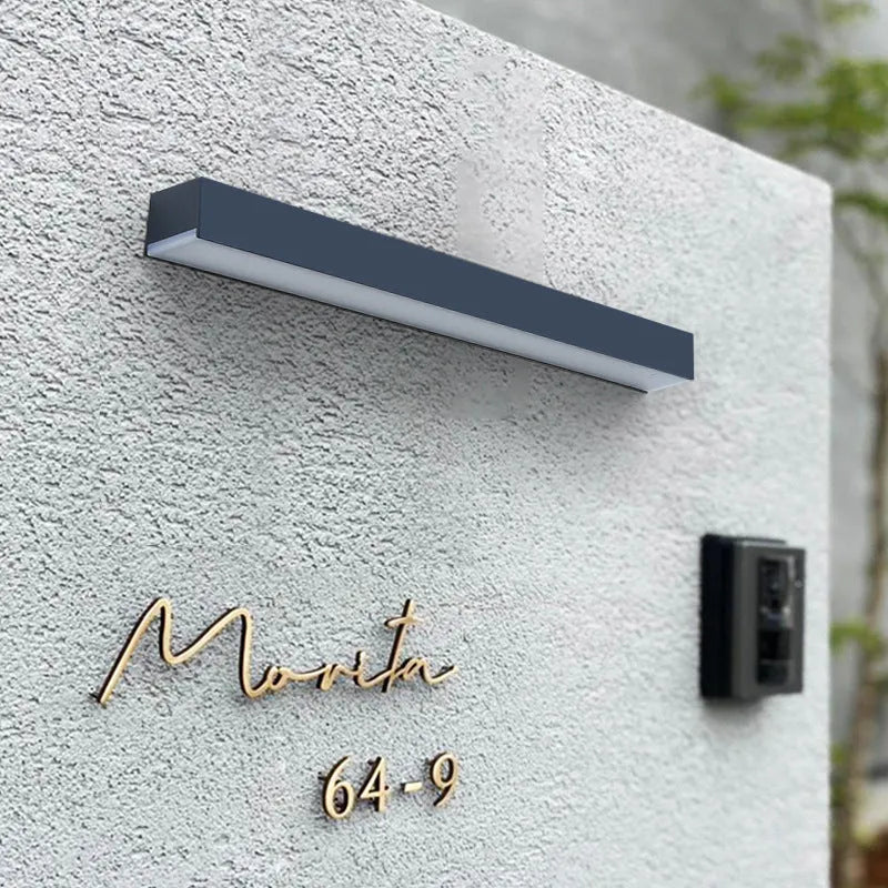 Black ABS plastic solar wall lamp for outdoor garden lighting with IP65 weather protection