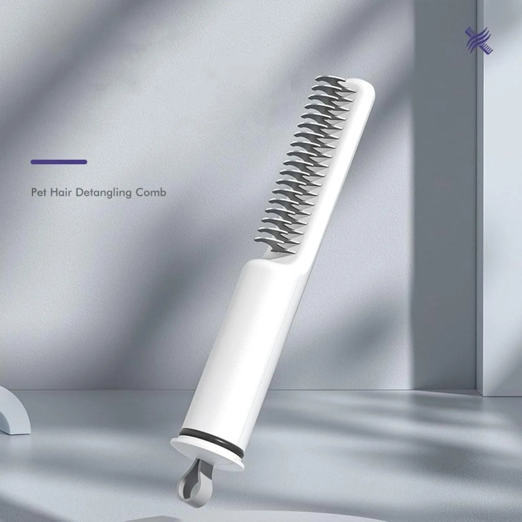 Pink and white stainless steel dog dematting comb with rake teeth on a wooden table.