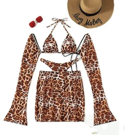 Leopard print women's bikini set with coordinating skirt on hanger