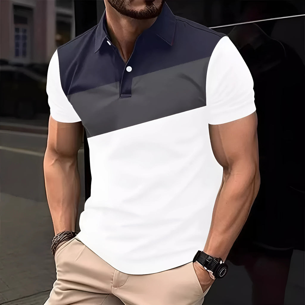 Men's loose grey t-shirt with a colourful 3D digital abstract print on the front.