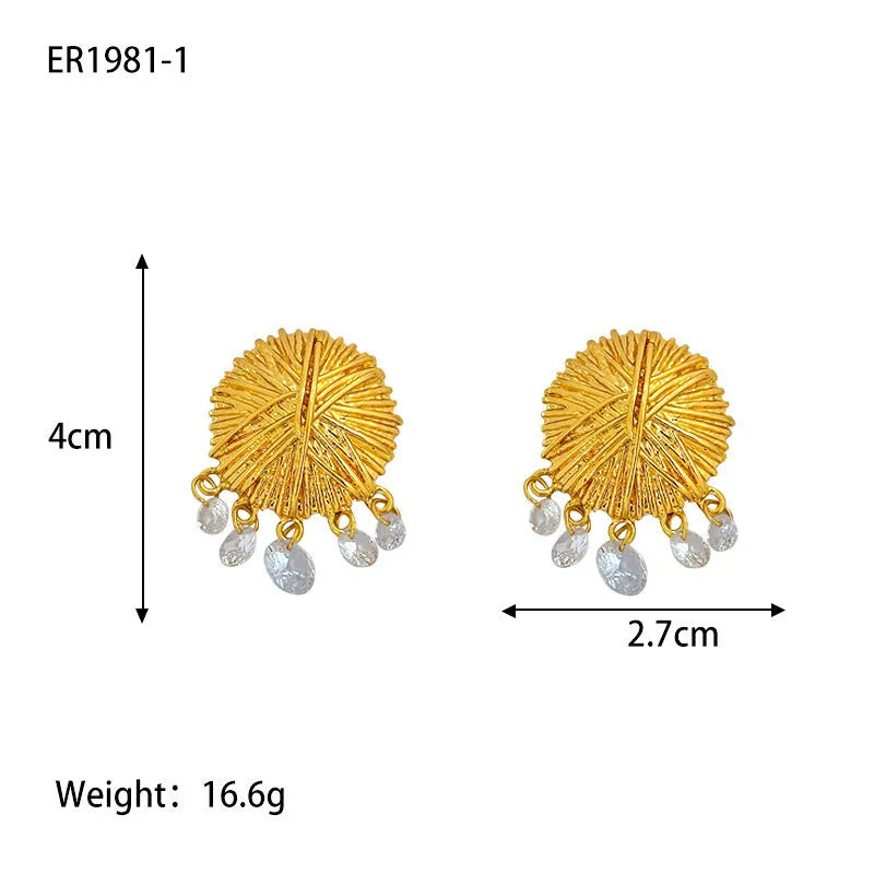 Women's gold geometric hoop earrings with round elements and electroplated finish