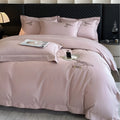 Solid colour pure cotton four-piece bedding set with light brushed finish on a bed in a modern bedroom