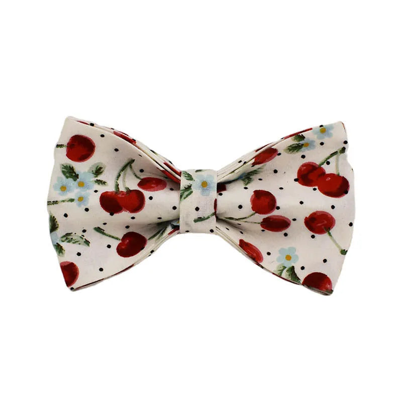 Red cherry print cloth dog collar with light gold release buckle, part of a five-piece pet accessory set.