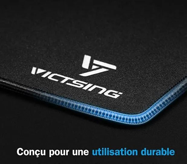 Black rubber gaming desk mat showing textured surface and 5mm thickness