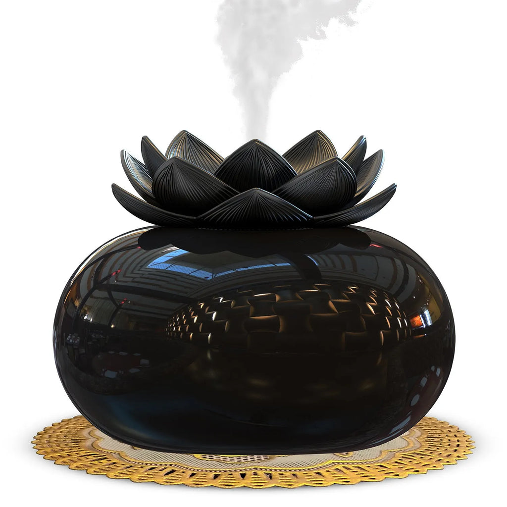 Pure black lotus-shaped USB aromatherapy humidifier with ceramic bowl on a table