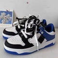 Low-top casual sneakers with synthetic leather upper, stitched detailing, and vulcanised rubber sole in white
