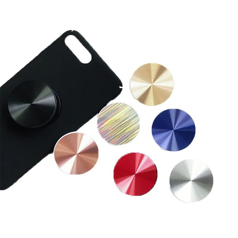 Ring phone stand in silicone and metal acting as a grip and stand for a mobile phone