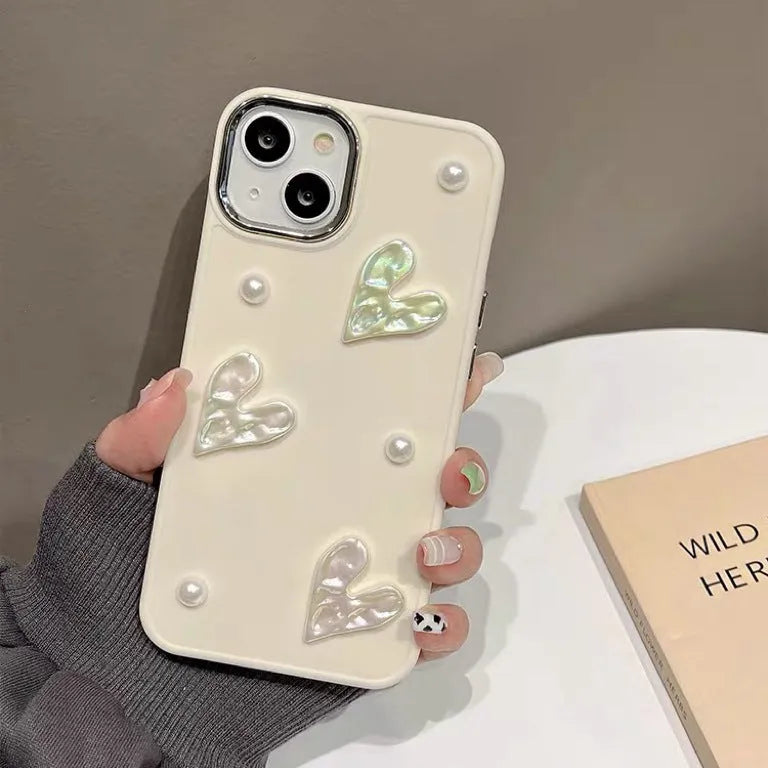 Milky white TPU phone case with pleated heart pattern and small pearl embellishments for iPhone
