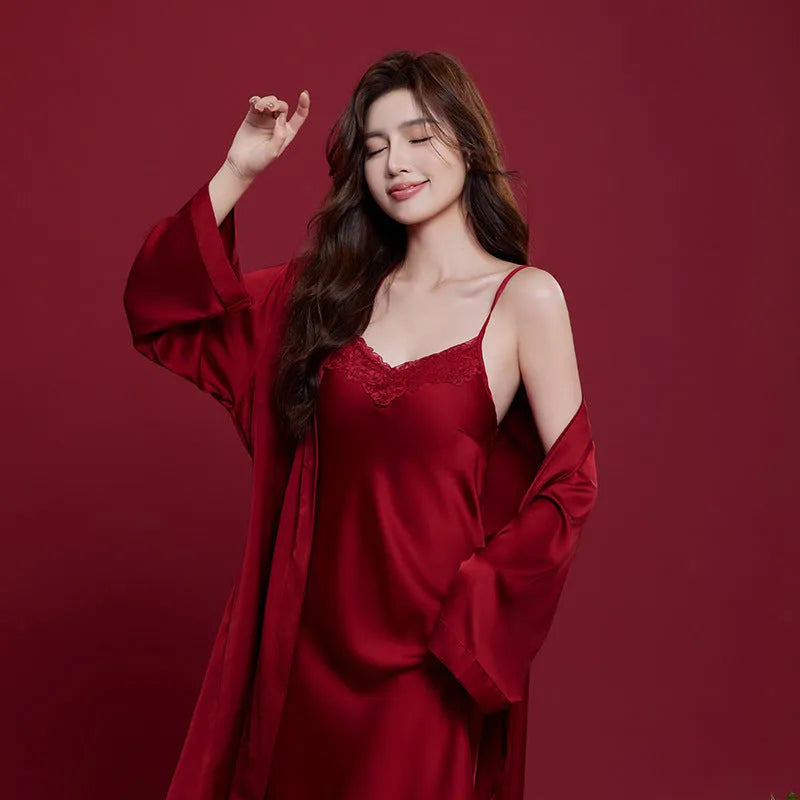 Red long-sleeved ice silk sleepwear set for a man and woman laid out flat.