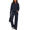 Women's long sleeve polyester leisure sports suit set with trousers in multiple colour options.