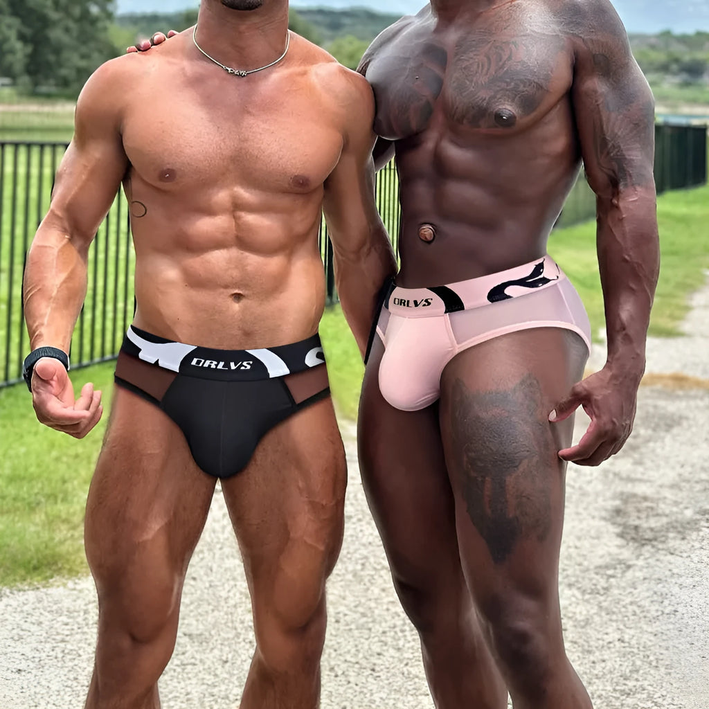 Men's solid colour modal mesh low-waist boxer shorts in black, pink, and red for sports