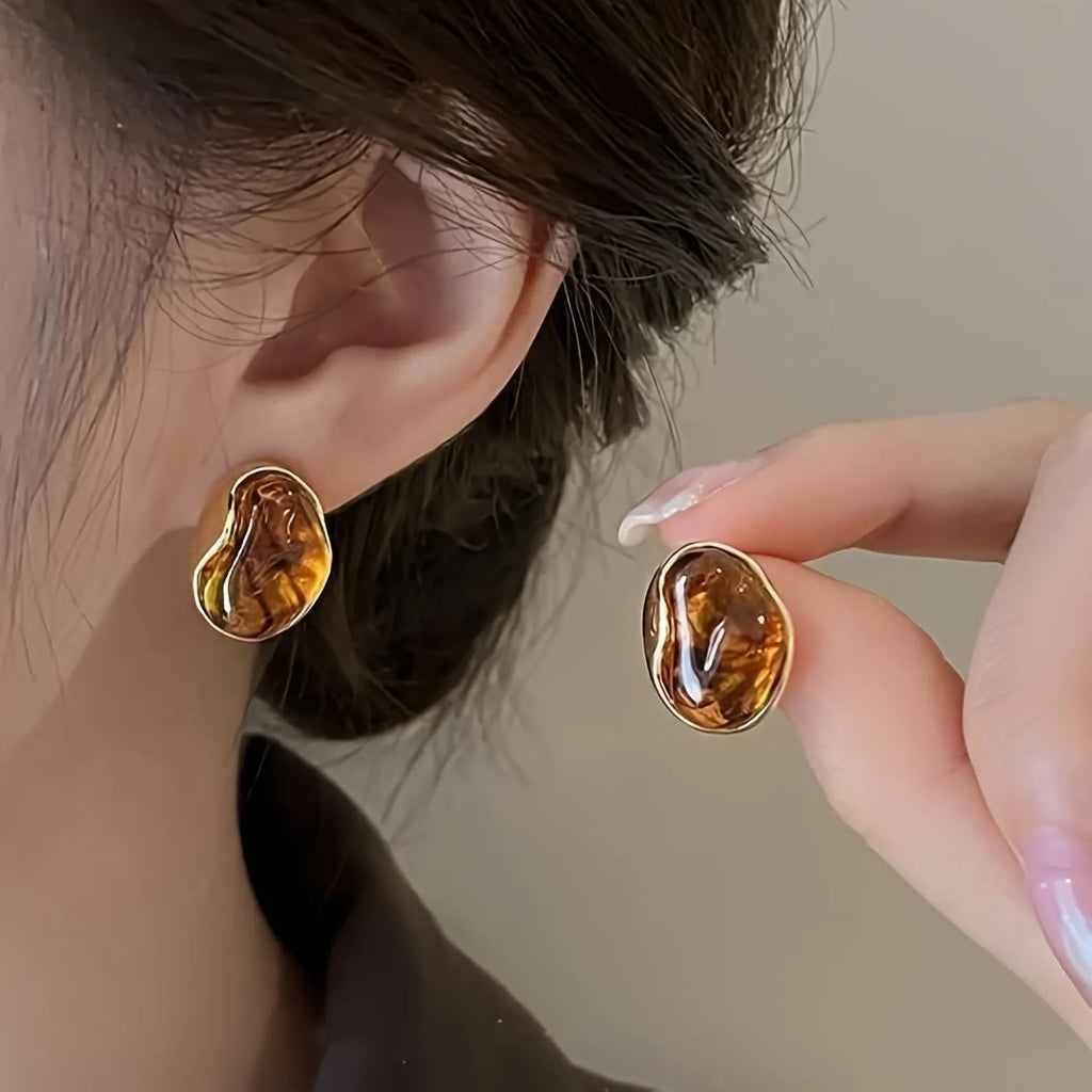 Handmade 3-pair women's holiday earring set showing geometric tassel designs in electroplated alloy