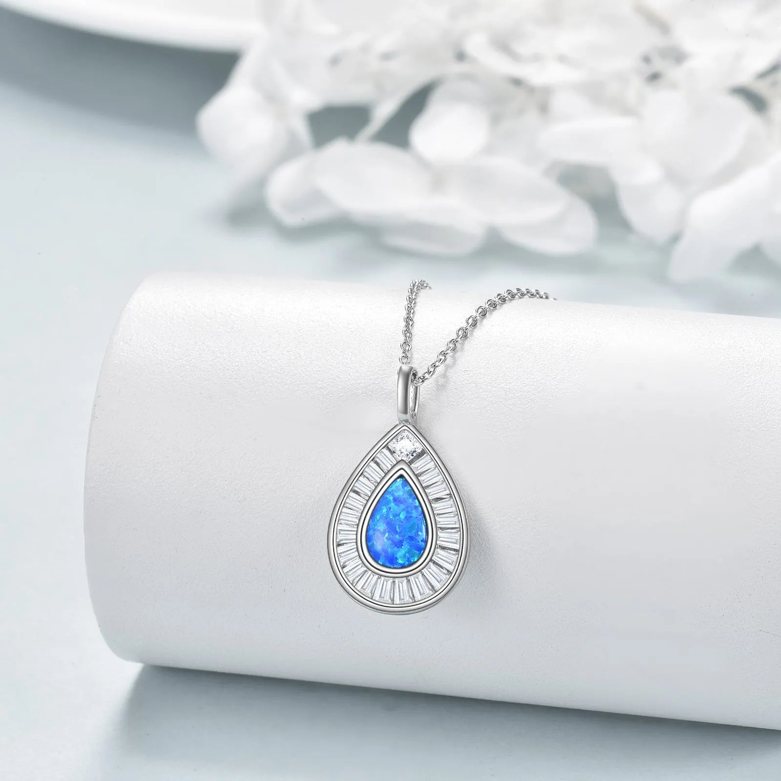 Sterling silver blue opal teardrop necklace with Austrian crystal on white gold plated chain
