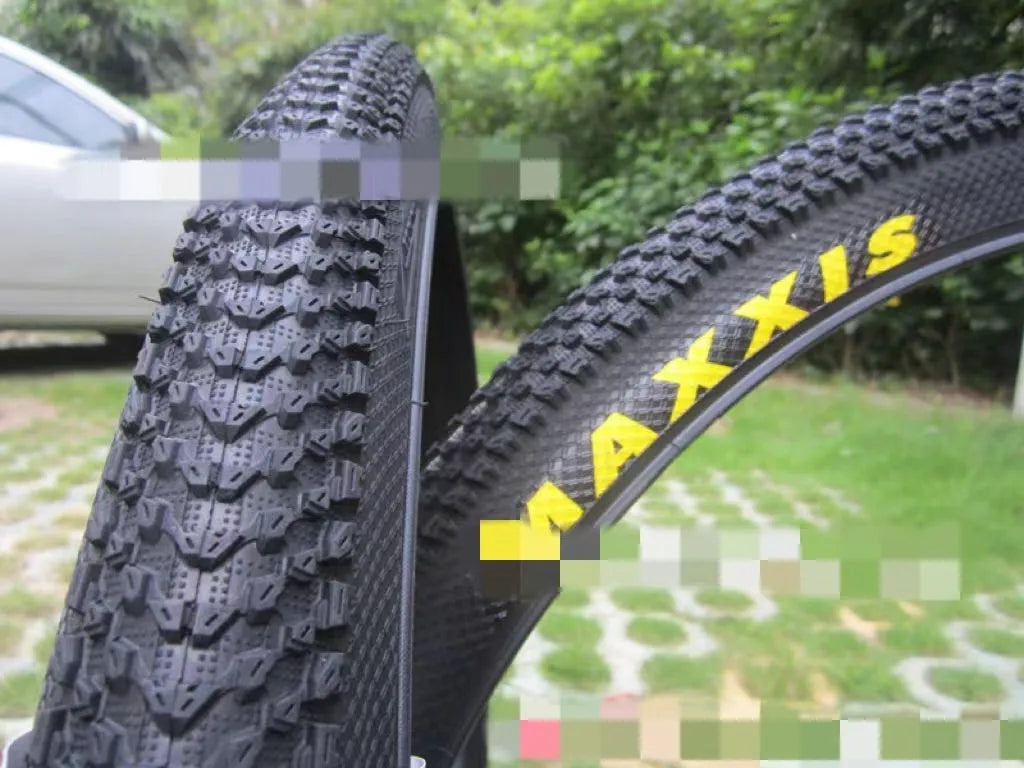 Ultralight puncture-proof mountain bike tyre showing tread pattern, available for 26, 27.5 and 29 inch wheels